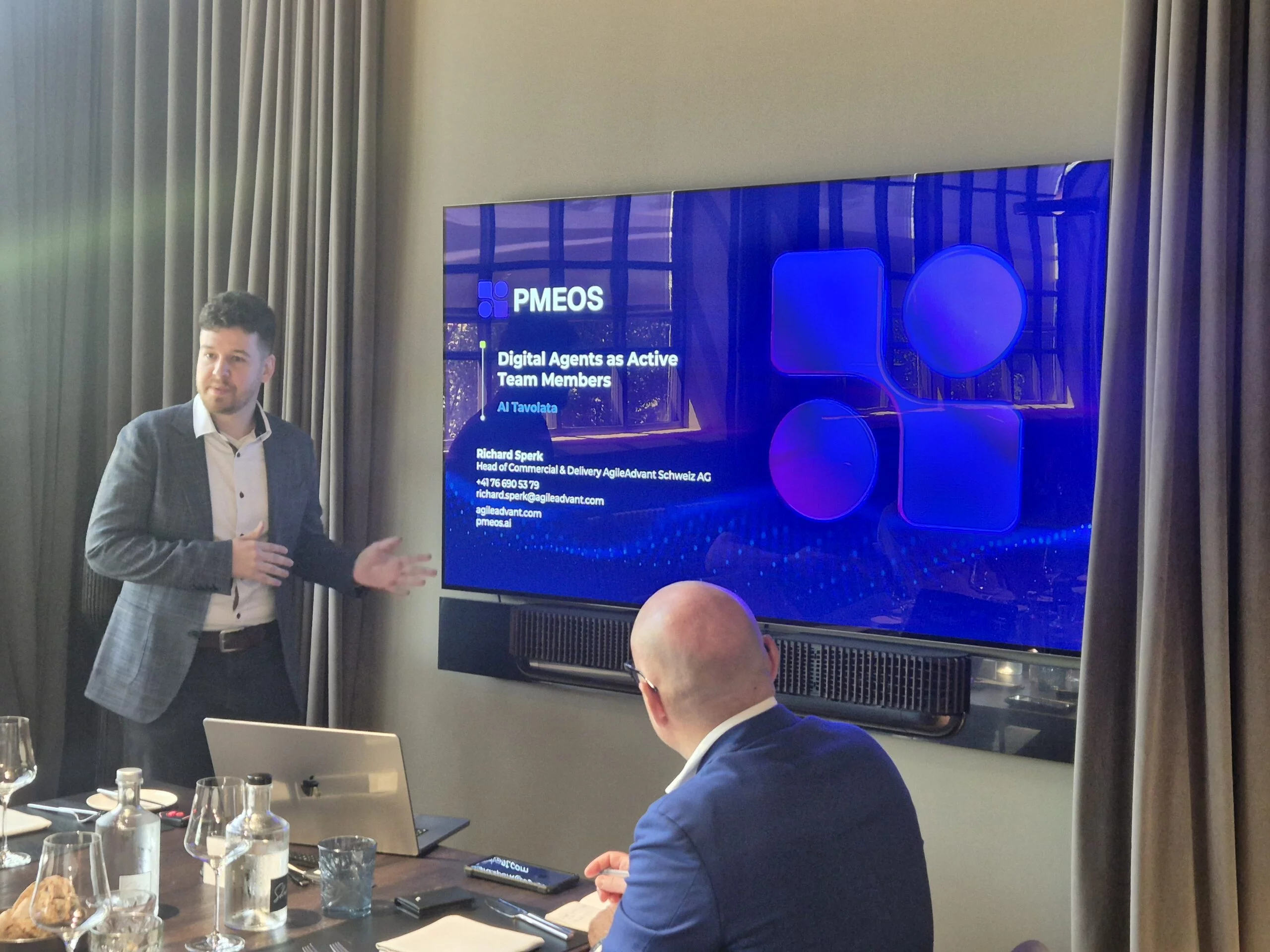 Explaining our AI-Powered Project Management Tool PMEOS to the participants of